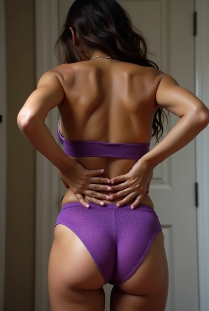 10 year old girl from behind wearing purple lingerie touching her buttocks