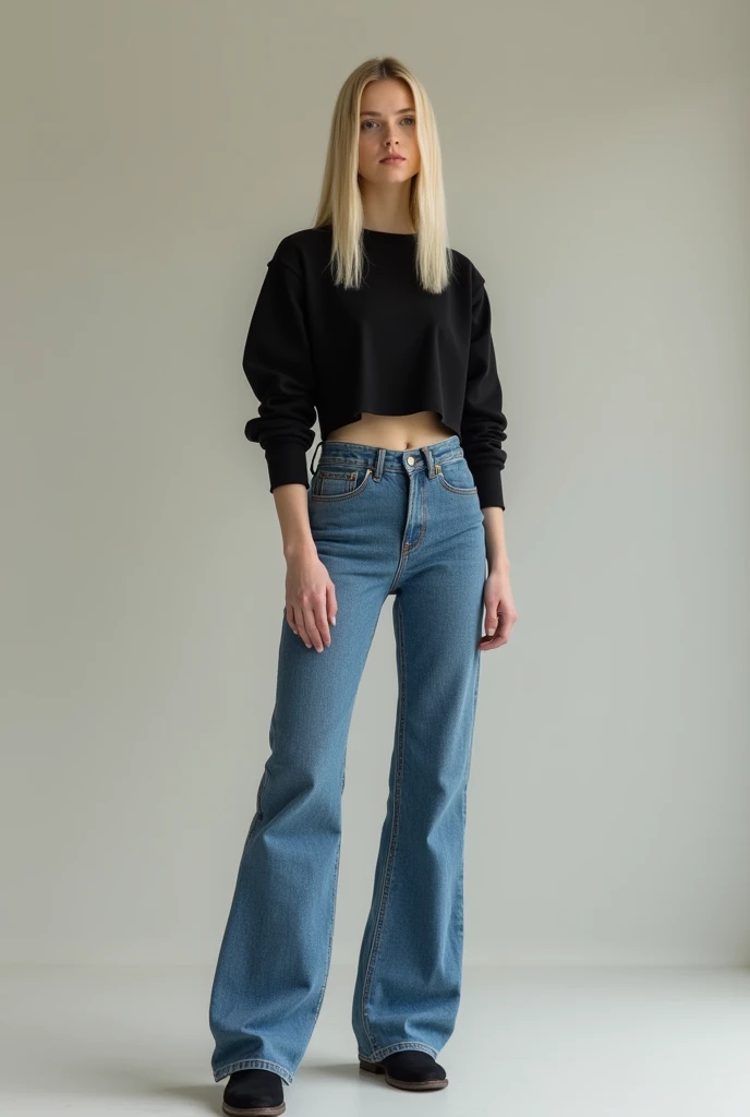 Blonde with straight hairs wearing a black crop top with medium long sleeves and blue narrow jeans