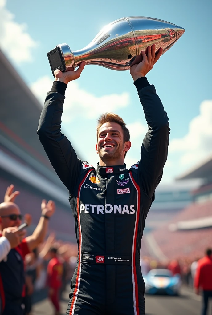 male race car driver with trophy in hand celebrating