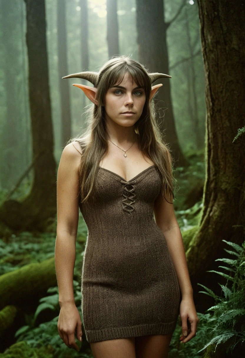 analog film photo, photo of a young elf girl, 18 years-old, elf, elf ears, long pointy ears, dark shaggy hair, sun-tanned complexion, goosebumps, pretty, natural beauty, tall, full hourglass figure, voluptuous, curvy, wearing a rib-knit mini-dress, posing in a misty forest, resembles a young Elizabeth Hurley, RAW Photograph, dslr, soft lighting, high quality, film grain, Fujifilm XT3, detailed skin with visible pores, insane details, masterpiece, 8k, 35mm photograph, dslr, kodachrome, faded film, desaturated, grainy, vintage, Lomography, stained, highly detailed, found footage, elven ears