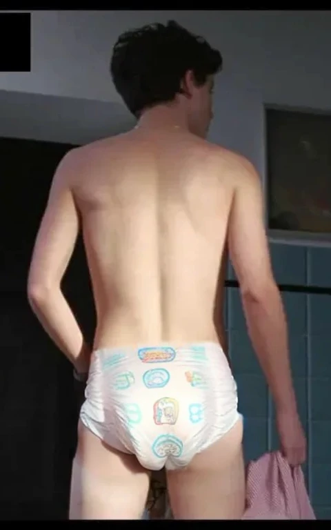Diaper, pampers pattern, Realistic photo of Timothée chalamet, young man, male, very skinny, bare legs, standing, view from behind, wearing a diaper