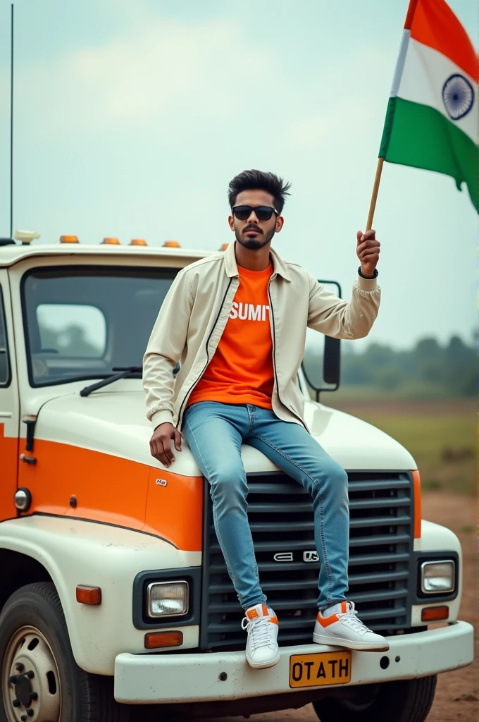 Create an Real image featuring a young man sitting on the hood of a white and orange truck, with india’s scenic background. He’s holding a flag celebrating india’s 15th August. The boy wears a orange and white T-shirt with “SUMIT” printed on it, white jacket, white orange, black shoes, and sunglasses.