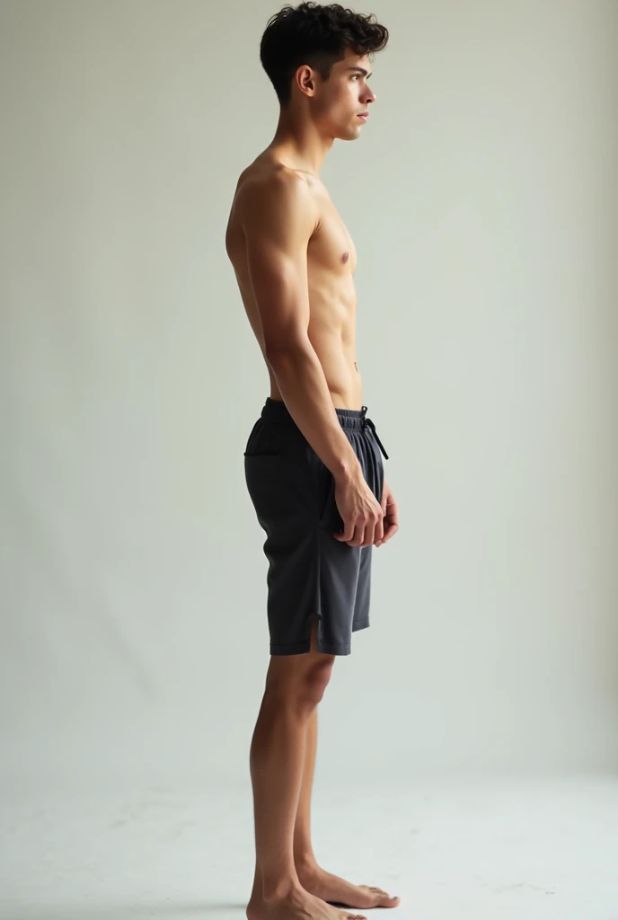 Young Man standing from legs to head pic taken from side