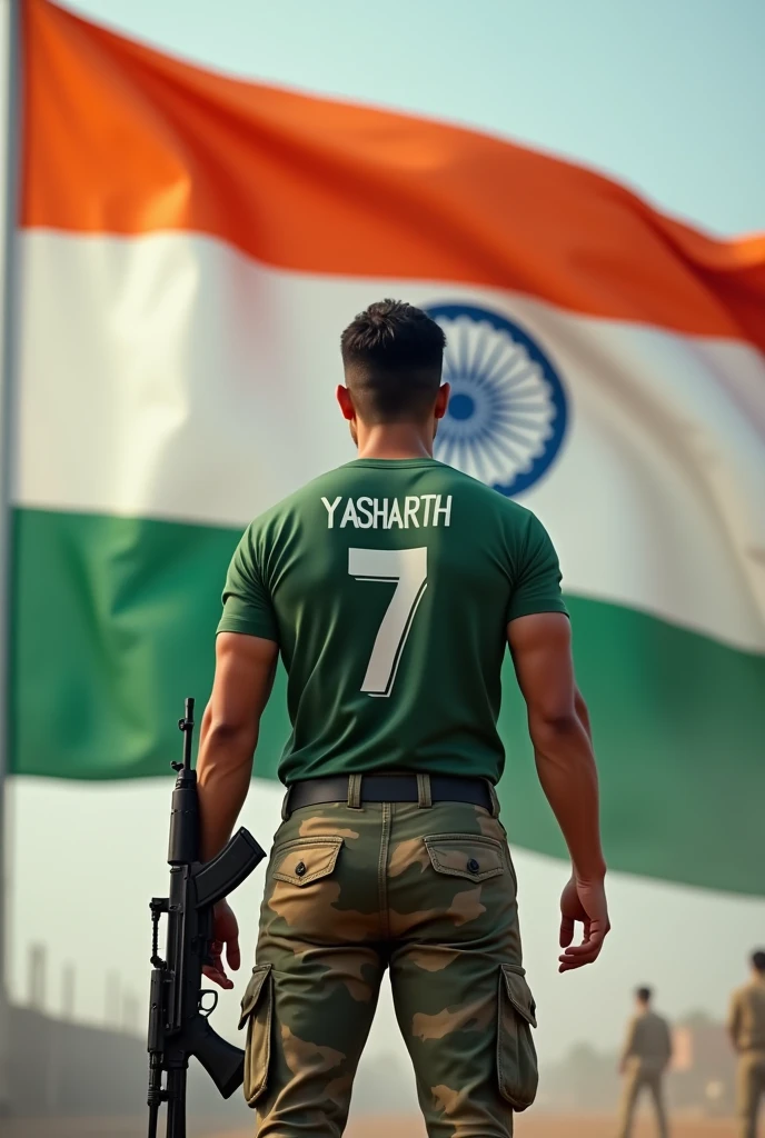 A huge tricolor flag of India is waving, in front of it an 18 year old army soldier is standing facing the flag, he has an AK-47 in his right hand and he has huge biceps and the boy wore a green T-shirt Has happened, on which 'Yasharth' is written and 7 is written below 'Yasharth'. Wearing army cargo pants and his backside is visible and Remember that flag is completely and clearly visual
