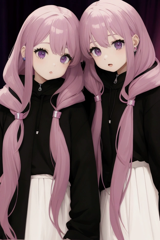 twin girls, one pink and one purple with long hair, all wearing black hoodies