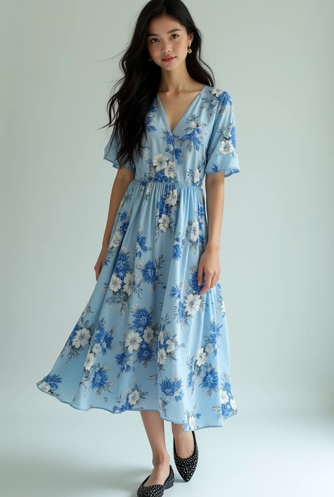 A 19 year old medium fair skin wearing a blue floral print A line dress , black wavy hair and embellished flats.