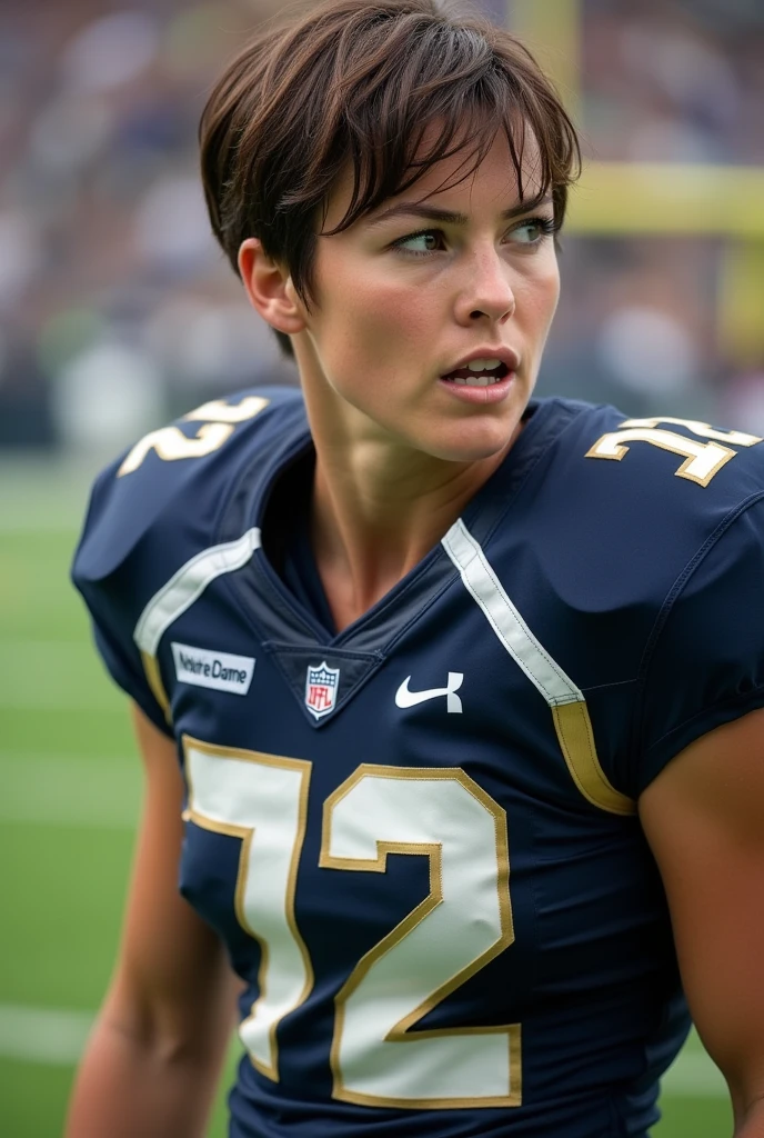A photo of Kasey Barrett, a running back for the female Notre Dame Fighting Irish football team. Number 72. Brunette pixie cut