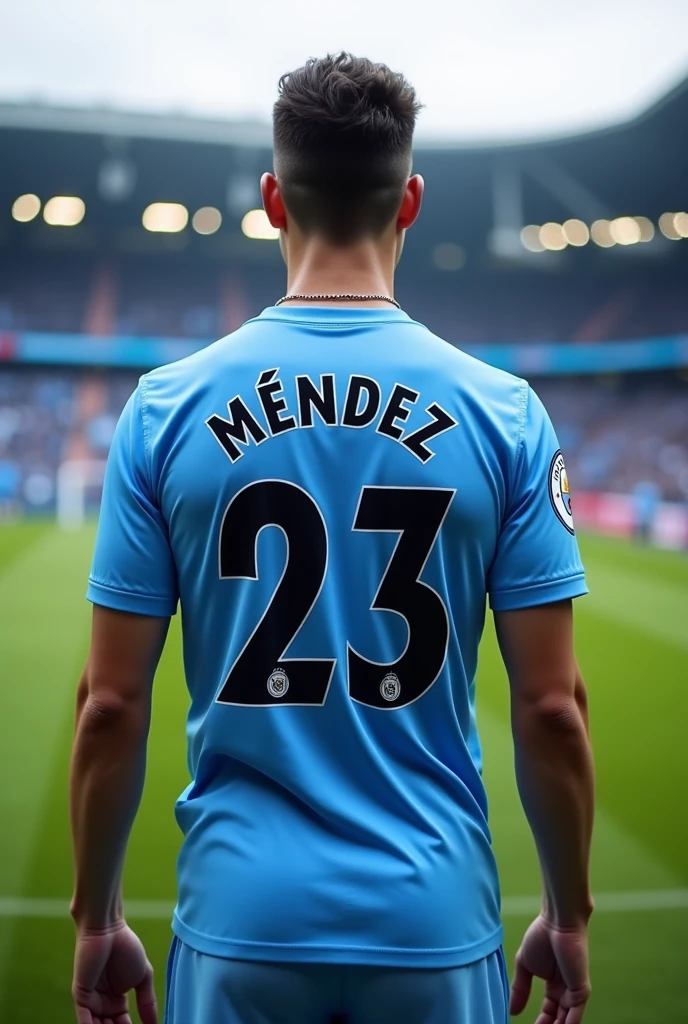 A Manchester City shirt with the last name Méndez and the number 23 on the back