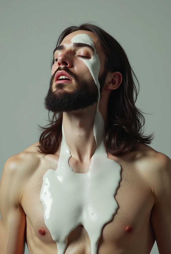 A hot naked smiling Jesus got sprayed at with a white slimy and sticky substance that drips down and covers his face and chest