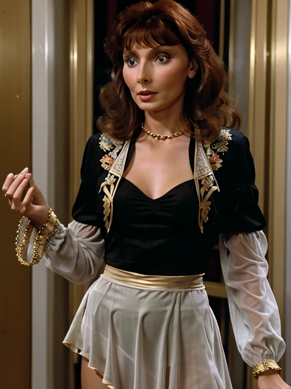 A gypsy (Beverly crusher) with green eyes black hair, sheer embroidered white blouse with gold medals and airy sheer red skirt with ruffles, seashell necklaces., no underwear