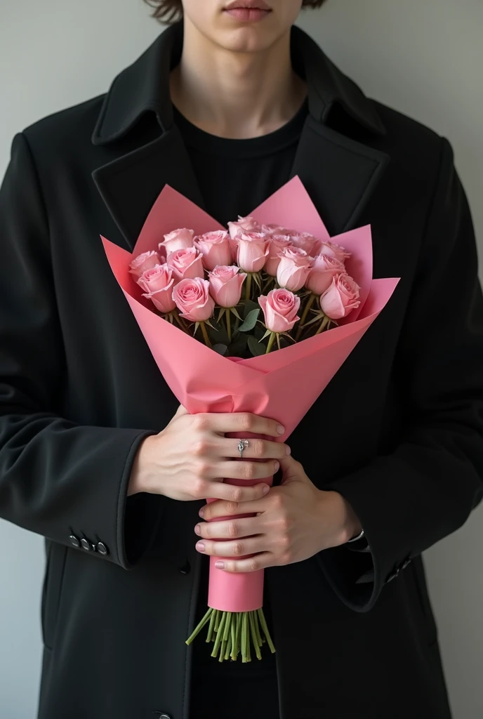 male teenage torso, with black coat, delicate hands with a ring, holding a bouquet of flowers, wrapped in pink paper