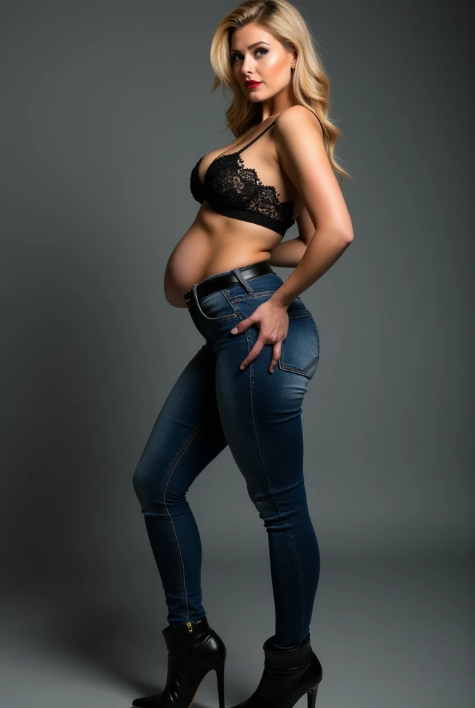 Blonde woman in profile with large glutes and very dark blue jeans clinging to her body, black belt, cropped black lace and black leather ankle boots high heel and sexy pose