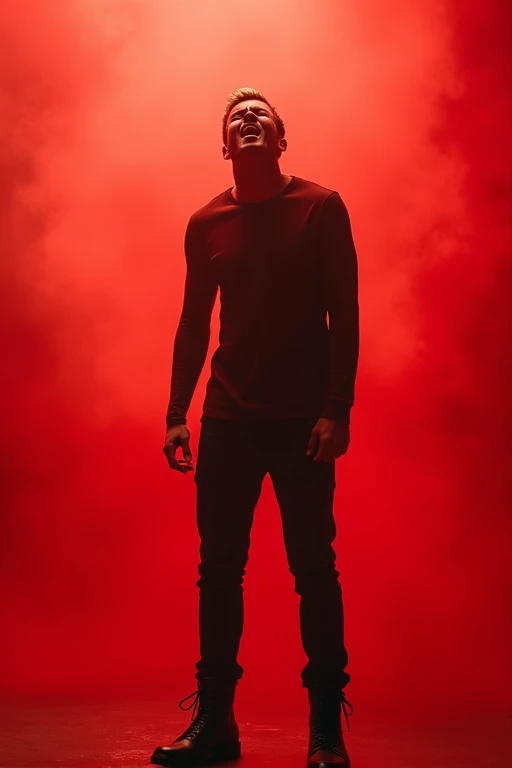 Make a tall young man with a normal body, blonde hair parted in an open book style, wearing black pants and black boots, shouting in hatred., in a red environment