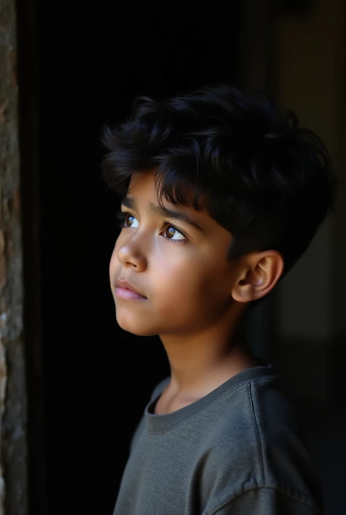 A 12 year old Mexican male teenager looking to the left slightly turned and with a dark background
