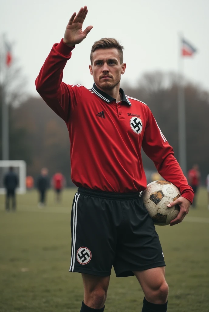 Nazi party playing football, with a swastika on his uniform, and raising his hand in the Nazi salute