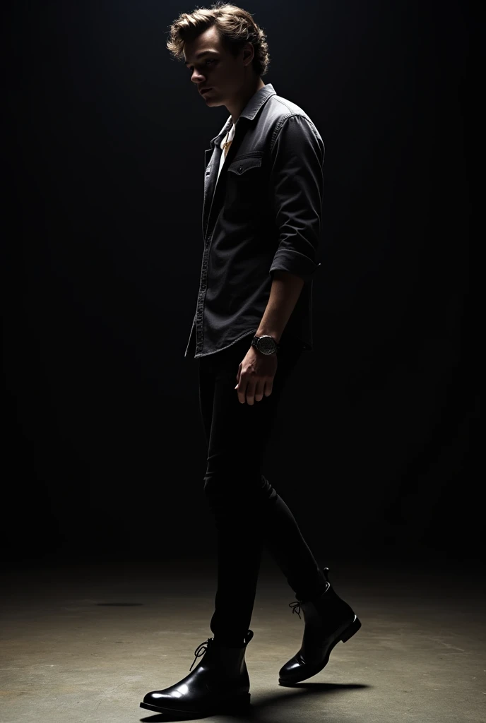 Harry Styles walking on a dark background, Chelsea Boots, black skinny jeans and a shirt of the same tone.