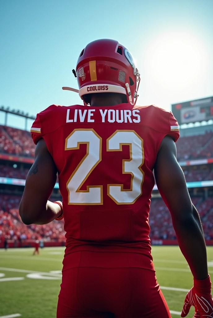 A back photo of a football player with the name live yours and number twenty three red jersey 