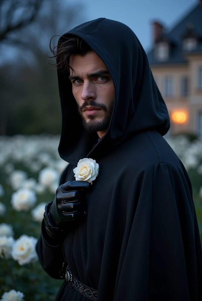 a young handsome european man black hair short beard blue eyes wearing a black noble cloth with hood cover his head with black gloves with a white rose brooch in the white roses garden at night with a manor house in the background with a stars