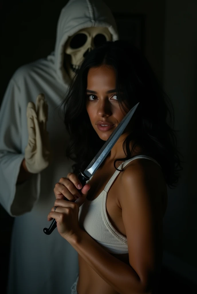 A Latina girl with tanned skin, a serious face, and a white, strappy top is semi-hidden in the darkness with a knife in front of her face, the shadow of Ghostface looming over her.