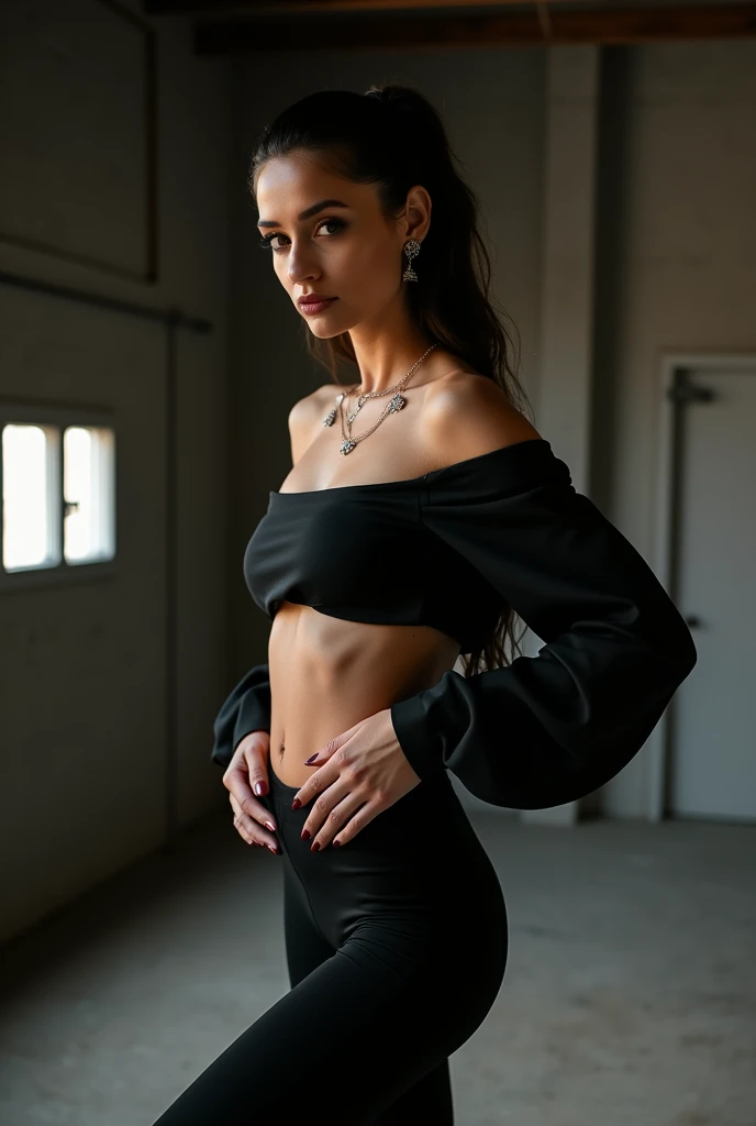 Woman wearing black panty and a black long sleeve crop top for a model photoshoot
