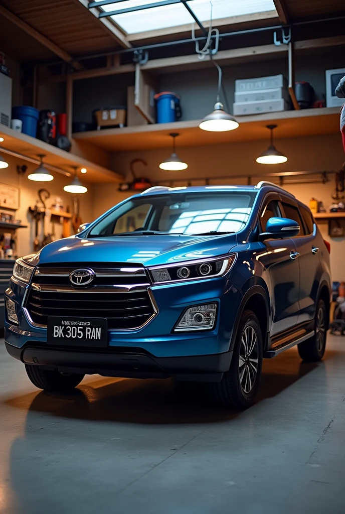 The blue Innova SUV is in the garage of the house , with BK 305 RAN plates