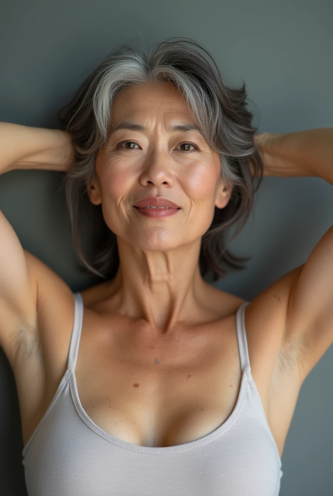 Mature Asian Woman, gray hair ,sexy expression ,55 years old, hairy armpits ,Unshaven armpits from a week ago ,Session, open legs,knees up, arms behind head, arms up,simple background, taken with a Fujifilm DSLR camera