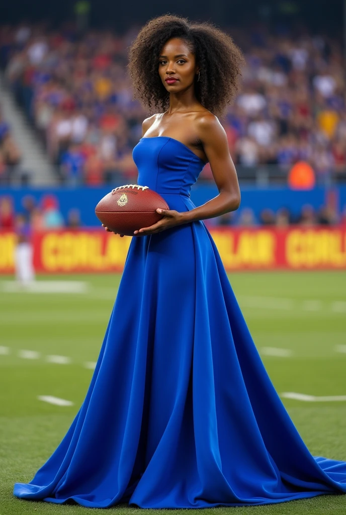 Beautiful black lady carrying football wearing a royal blue gown