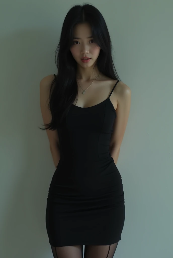 (photorealism:1.2), beautiful korean, 35 years, front view, long hair, short sleeveless black dress, black stockings, black heels, hands behind back, terrified facial expression