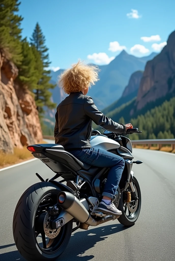 Someone with curly blond hair sitting on a mt 09