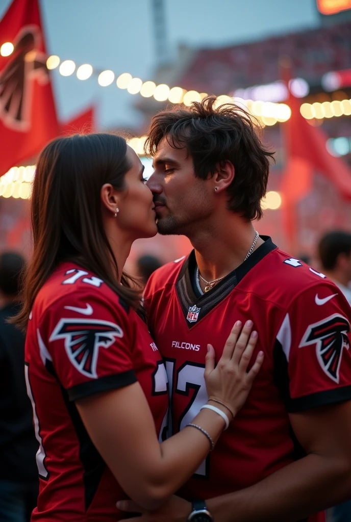 Kirk Cousins kissing in atlanta falcons jersey