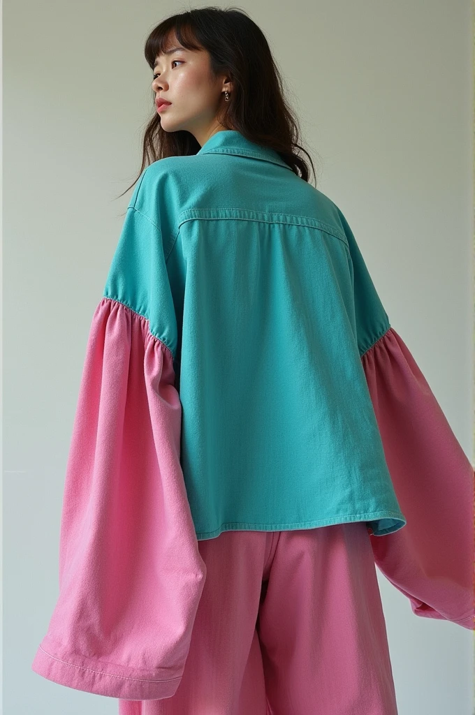 Turquoise flannel with long pink sleeves
