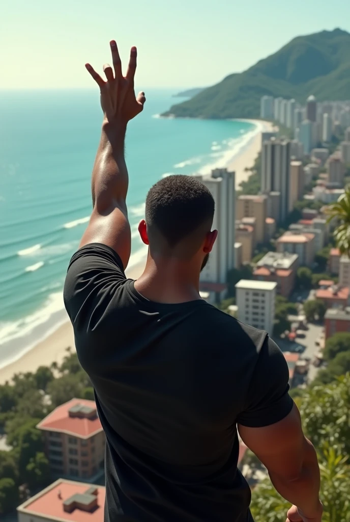A strong white guy at the top of a favela in a black shirt,shoreline ,with the left arm making the two-finger cinbolus 