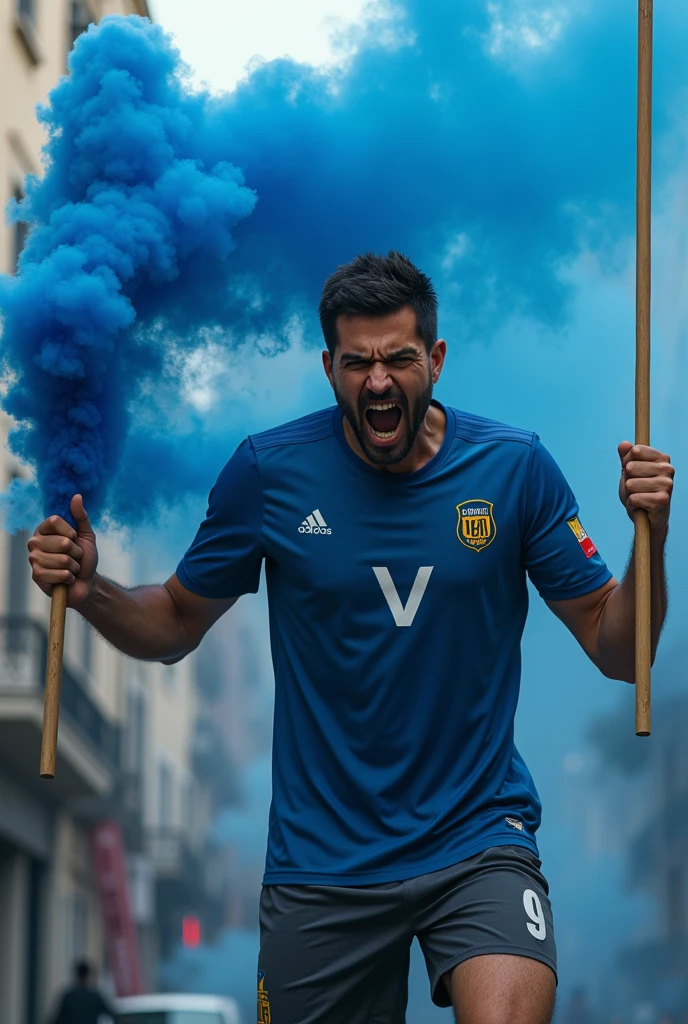 A hooligans with a flag and a blue flare in shorts and a blue football shirt and a white V on the chest