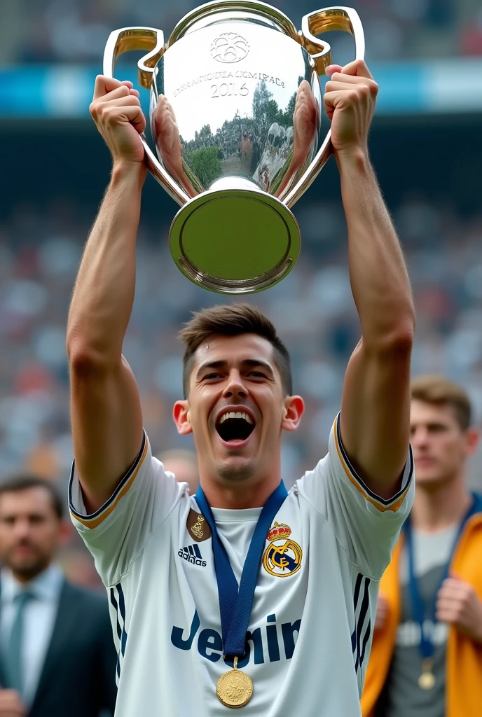 A young man holding up the Champions League trophy with a Real Madrid shirt, and with the number 17 and the name J.Matthew