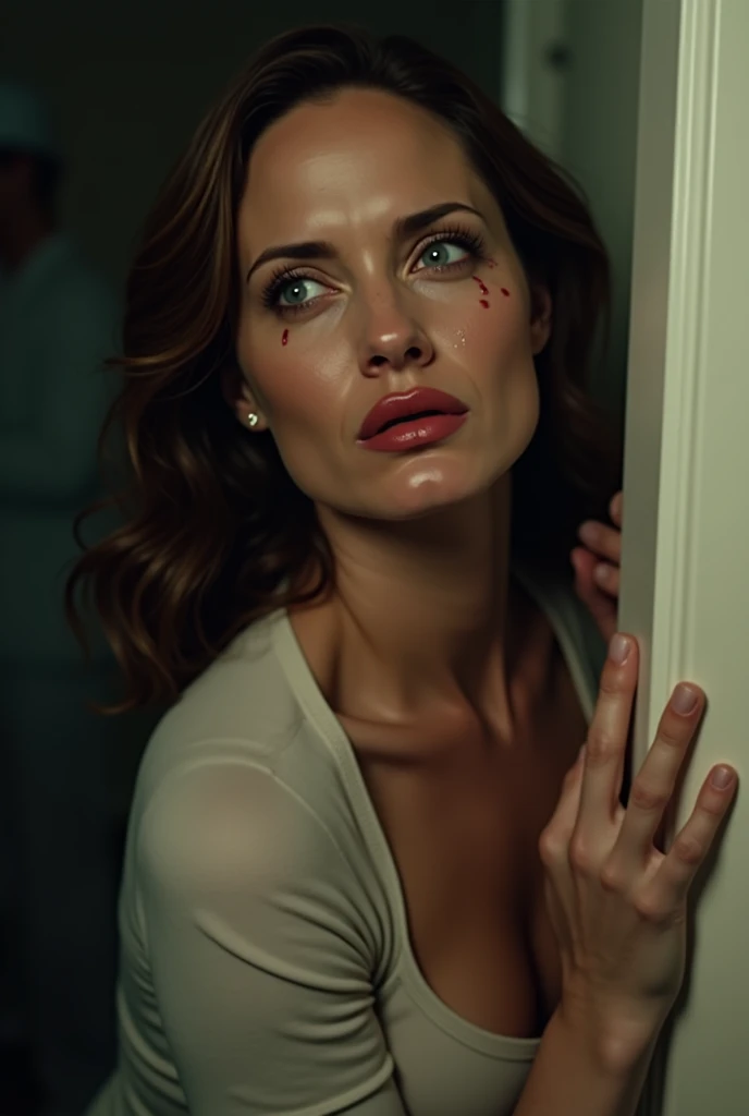 Angelina jolie having heart attack , sweating, teary eyes, clutching chest, leaning on wal