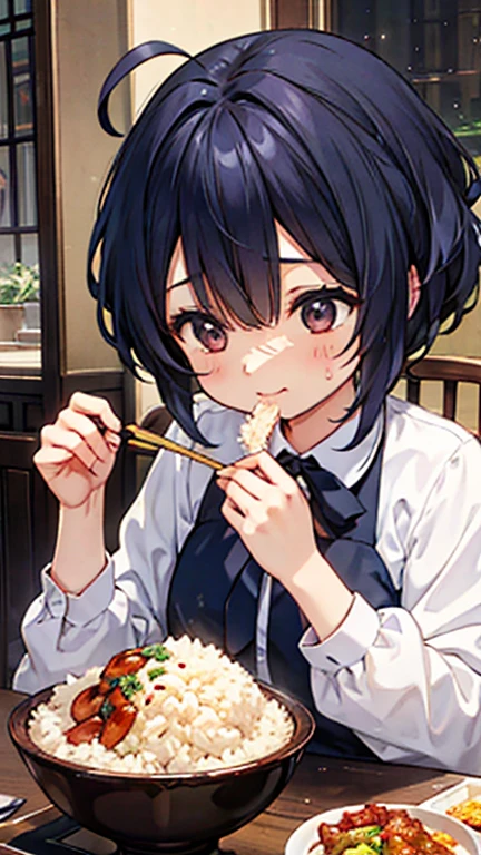 A girl eating delicious rice