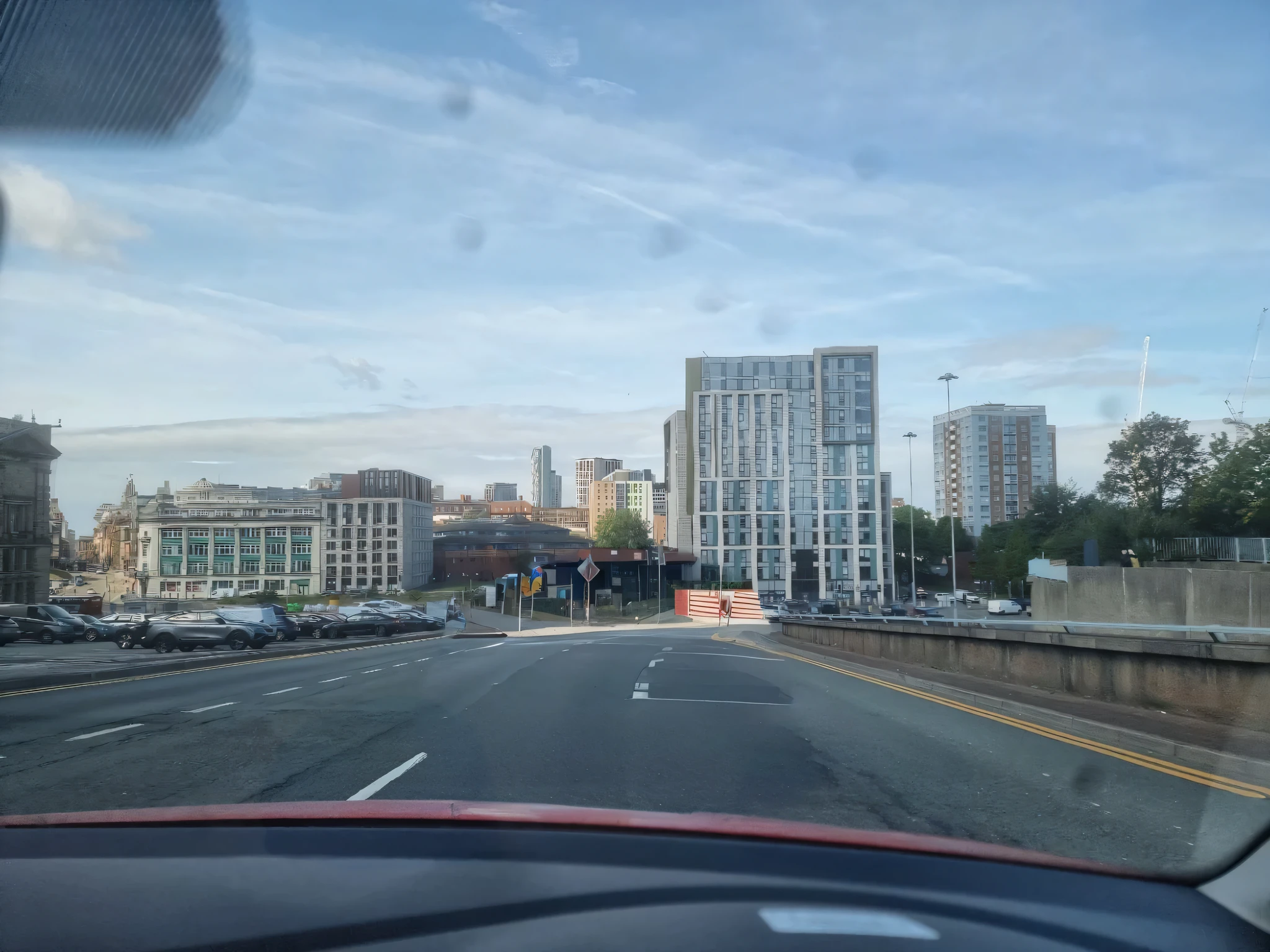 The tarmac on a road ahead. No cars, no road markings, Sunny day. Cityscape