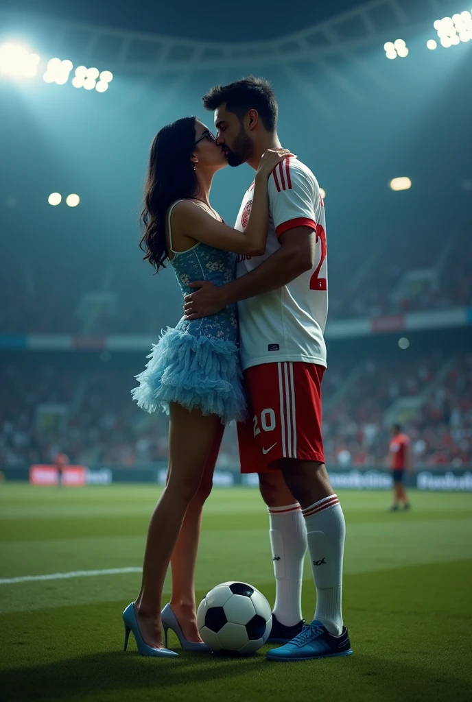 A man and woman kissing eachother in football stadium ground at night time all spot light on them woman is wearing glasses and had black hair . Woman is wearing blue dress high heels and a lab coat over dress. Man is wearing white and red colour 32 number jersey. Siddharth written on jersey. Woman is cupping man s face . Man s one foot resting on a soccer ball. Man is 1 feet taller than woman. Add some audiance in stedium . Make man s tall than woman . Make it realstic..make boy handsome . Make dress long, floral and fluffy. Remove lab coat. . Man is tall . Man and woman doing make out . They are kissing each other passionately. Make dress short .woman is wearing denim and crop top