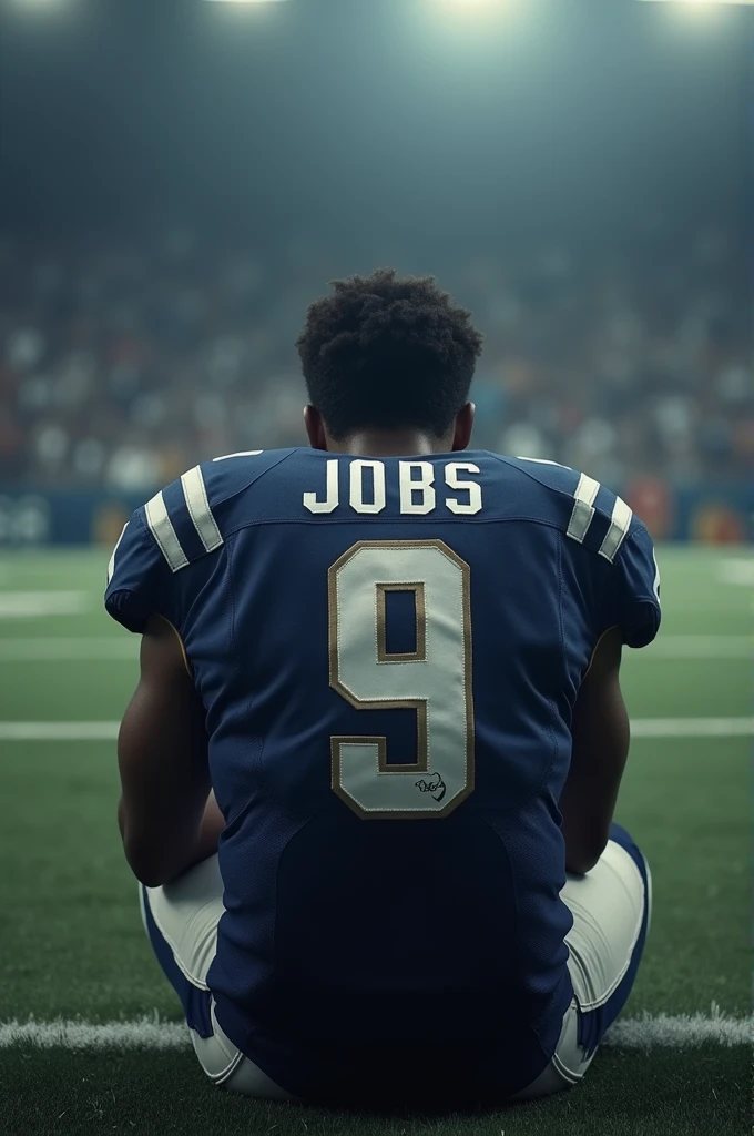Football player sitting with his back turned with the name Jobs
