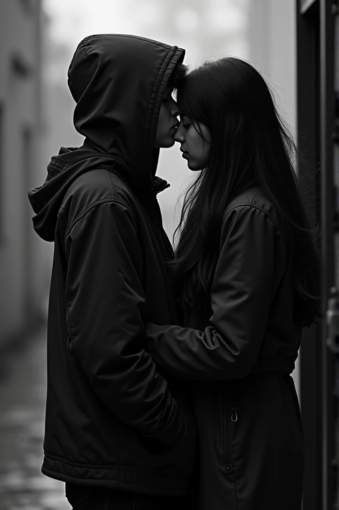 A teenage boy and girl kissing, In the photo you can see more of the boy and he has a hood, You can't really see the boy's face through the hood., The girl's face is not visible because the boy's head is covering it., The photo would be in black and white and would be almost like a selfie.