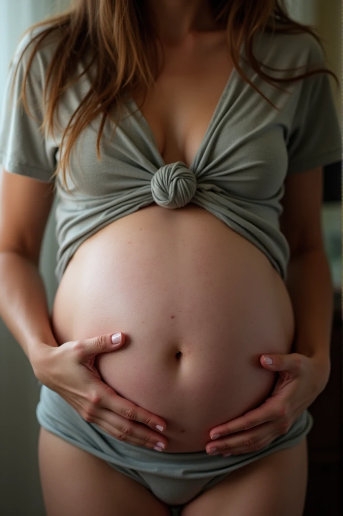 a girl with a swollen belly full of sperm