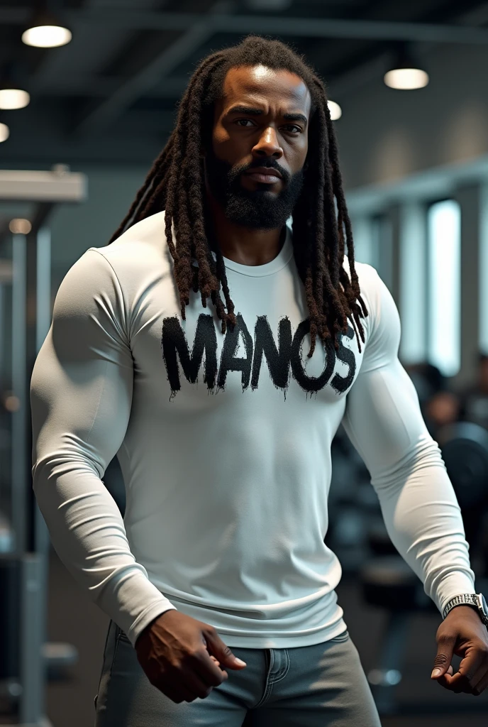 Black man with dreadlocks in a gym wearing a white long sleeve shirt with the word manos written in venom letters