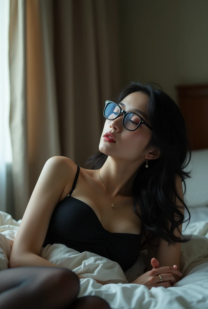 Asian girl withglasses in a dark room hidingg in a pillow selfie