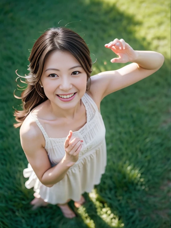 A drone-captured aerial view of a beautiful Japanese woman standing in an open field, looking up towards the sky with her arms fully raised in a joyful, celebratory gesture. The perspective is from directly above, highlighting the height and distance as the drone captures her entire body in the frame. She has a delicate and symmetrical face with soft, refined features that remain visible despite the top-down angle. Her dark, glossy hair flows around her as it is gently tousled by the breeze. She is wearing a flowing white dress that contrasts elegantly with the lush green grass beneath her, and her long, graceful legs are visible in the full-body shot. Her expression is serene and joyful, her large, expressive eyes gazing upwards as the sunlight casts soft shadows, enhancing the depth and realism of the scene. The aerial view emphasizes the sense of openness and freedom in the moment.
