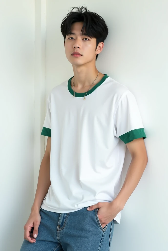Realistic photo of a 22 year old Korean boy, neck length straight black hair, cute and very pretty face, thick lips, squashing eyes, Muscular and strong body, kpop idol, wearing a white shirt with green trim on the short sleeves tucked into loose baggy jeans, making hand gestures, leaning against the white wall with noises, posing to photo, POST for Instagram 