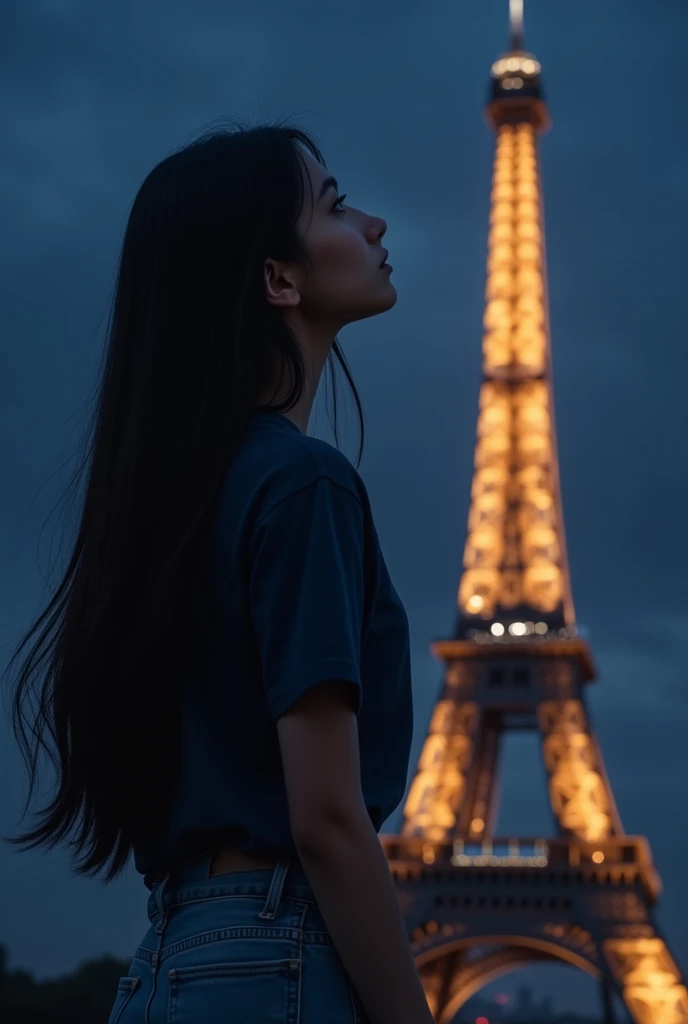 Girl , 163 height , 57 kg healthy , long black hair, blue loose jeans , dark blue t-shirt ,face round, eyes are black-brown, at night in the dark in paris looking at the elf tower ,