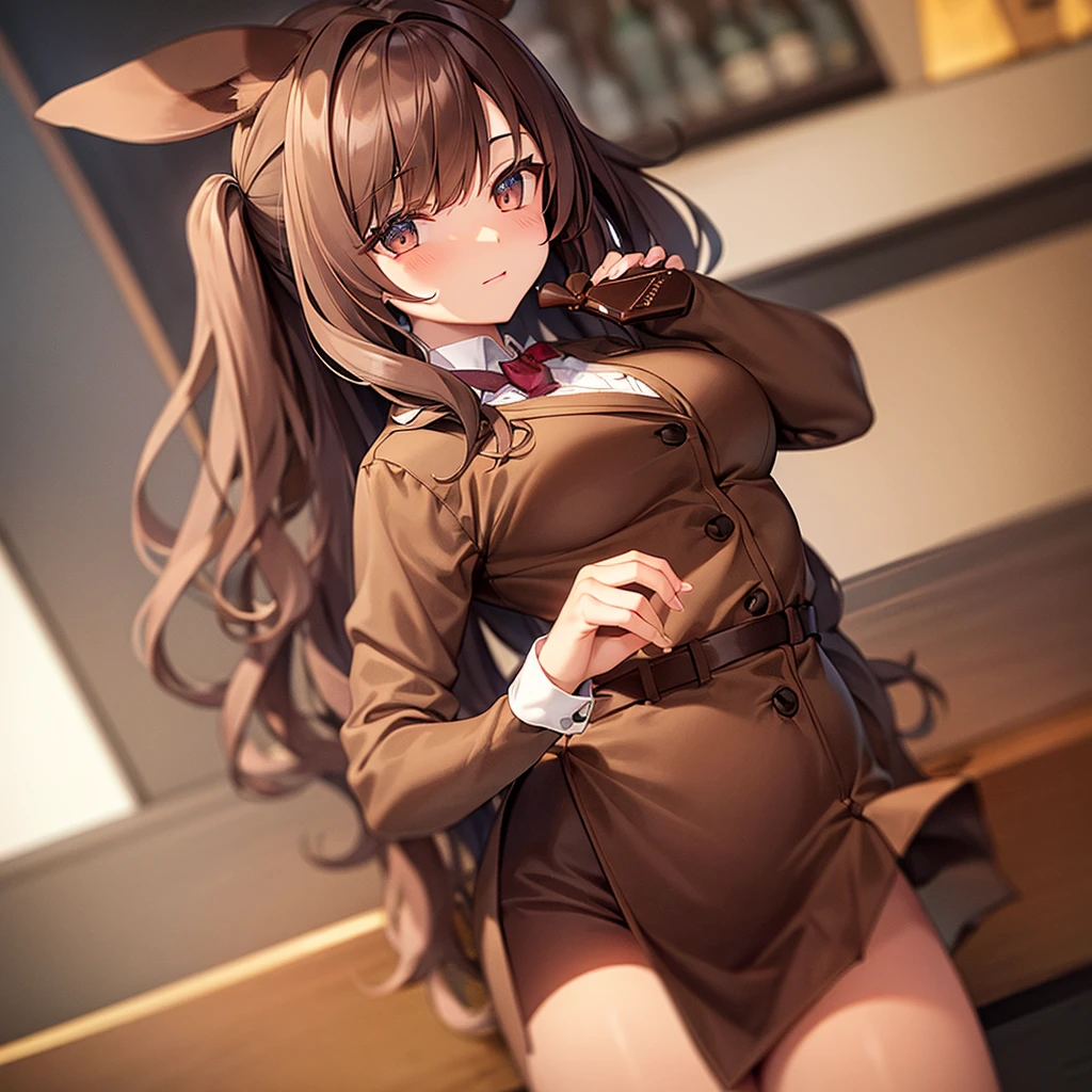 A woman wearing a brown Bunny Girl outfit holds a chocolate in her hand.