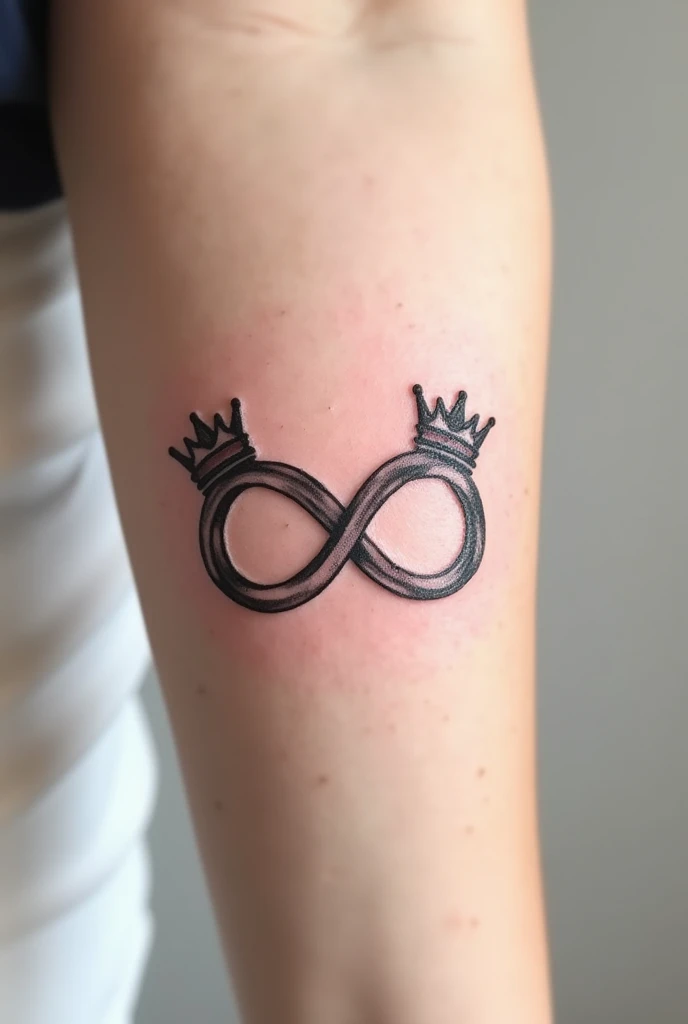 An infinity loop tattoo with mom and dad&#39;s names and a crown on top of each name