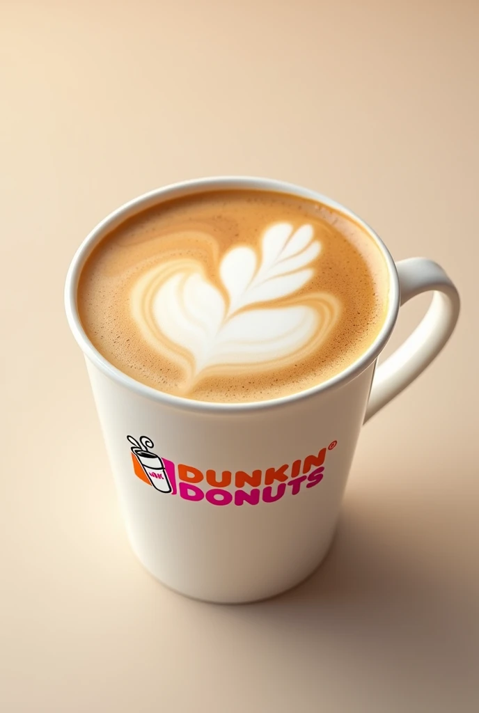 A latte coffee shot from a top angle, zoomed in, with milk, in a white cup dunkin donut
