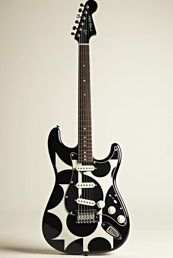 Fender brand stratocaster guitar with black and white geometric circles and squares only on the pickguard